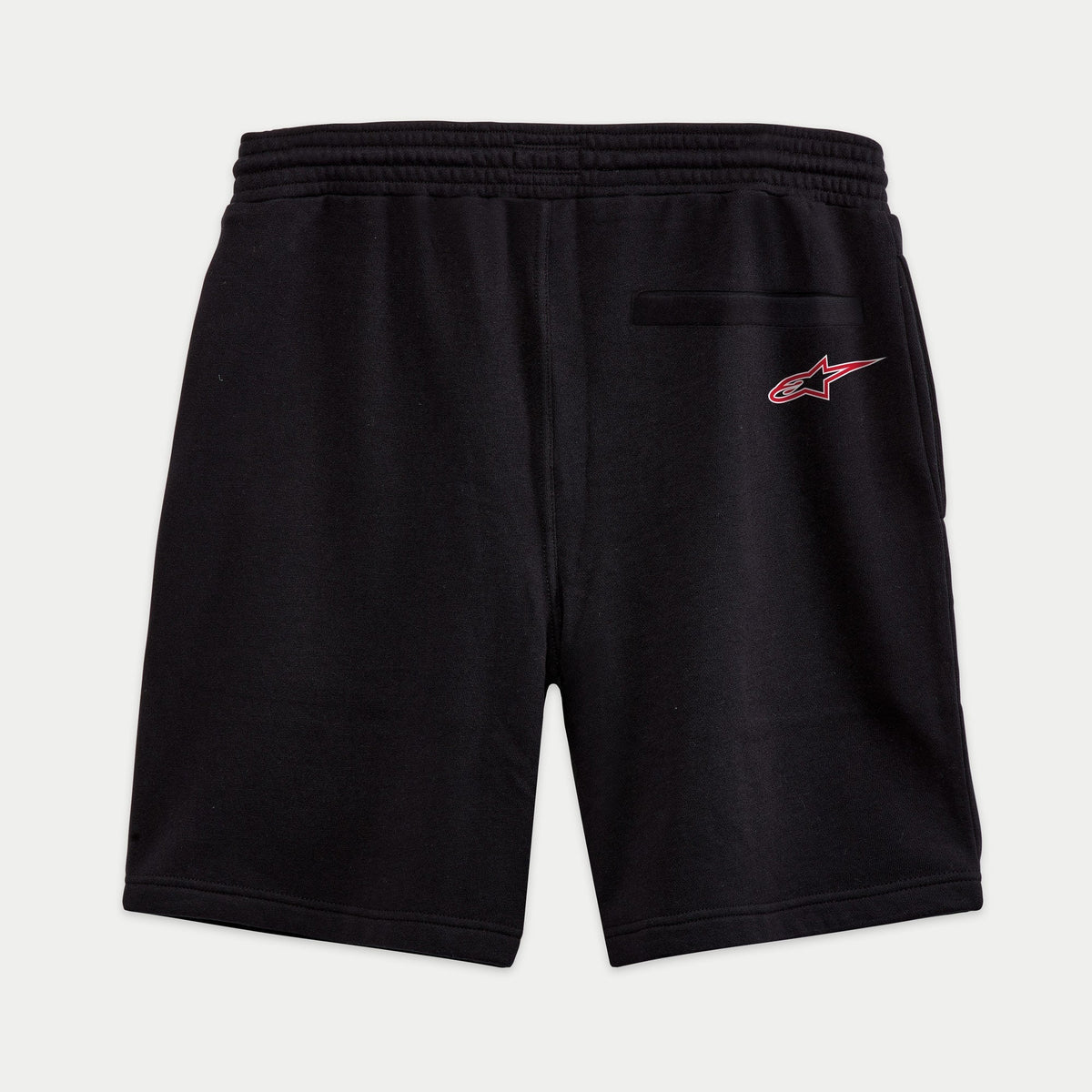 Alpinestars Dunker Short, pantaloncini da allenamento in pile, nero, vista posteriore con logo Ageless rosso e bianco sulla tasca a filo, cintura elastica, design casual e sportivo