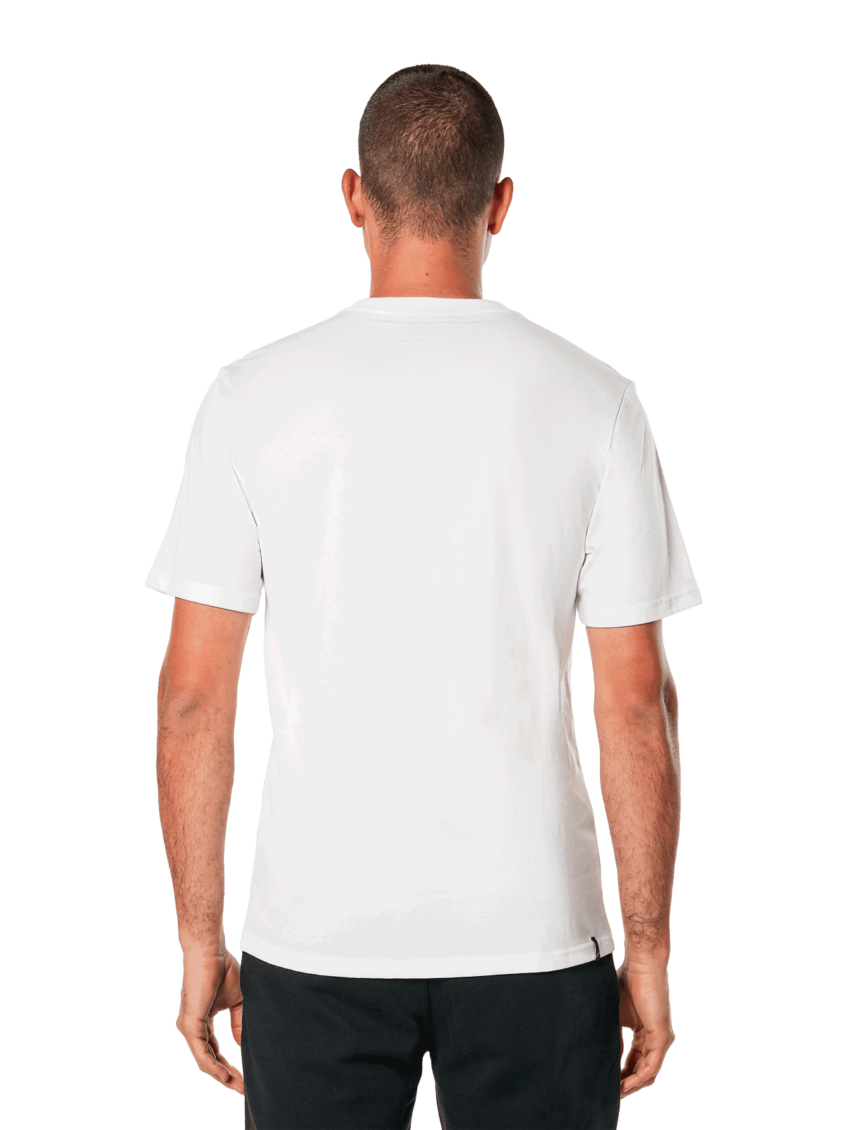 T-shirt Alpinestars MX Helmet CSF, maglietta a maniche corte, bianca, vista posteriore, indossata con pantaloni neri, design casual d'ispirazione motorsport