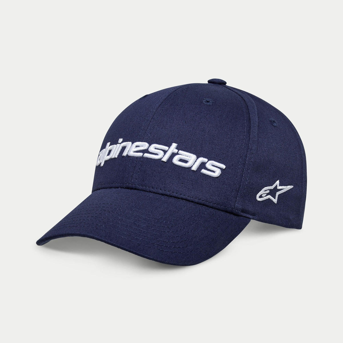Cappello Alpinestars Linear Wordmark 2.0, blu navy con ricamo bianco, snapback con visiera curva con logo Alpinestars lineare 3D e logo Ageless a stella laterale, abbigliamento sportivo casual