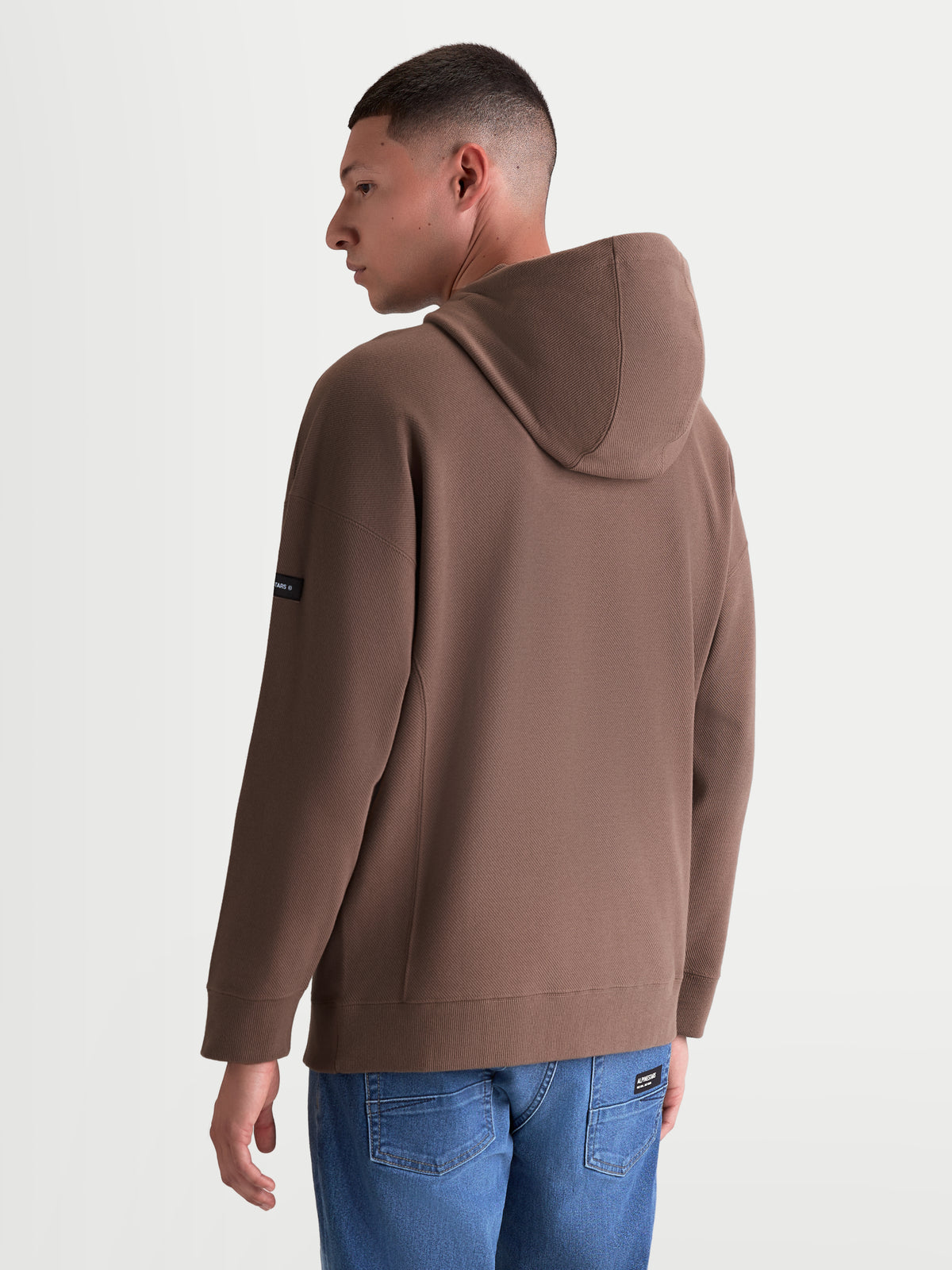Alpinestars Felpa con cappuccio Camino Textured Oversized, felpa sportswear casual per uomo e donna, marrone taupe, maglia in twill testurizzata, vista posteriore con vestibilità rilassata e logo sulla manica