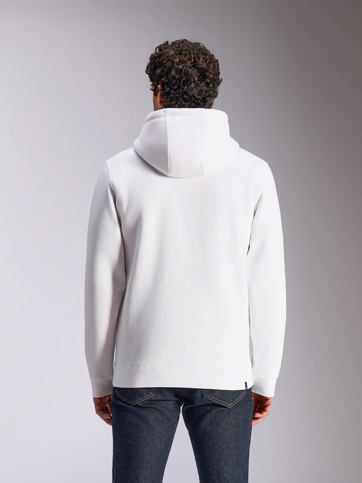 Alpinestars Blaze V3 Hoodie, vista posteriore, felpa pullover in pile bianca, cappuccio foderato in jersey, maniche lunghe con polsini e orlo a costine, streetwear casual ispirato al motorsport