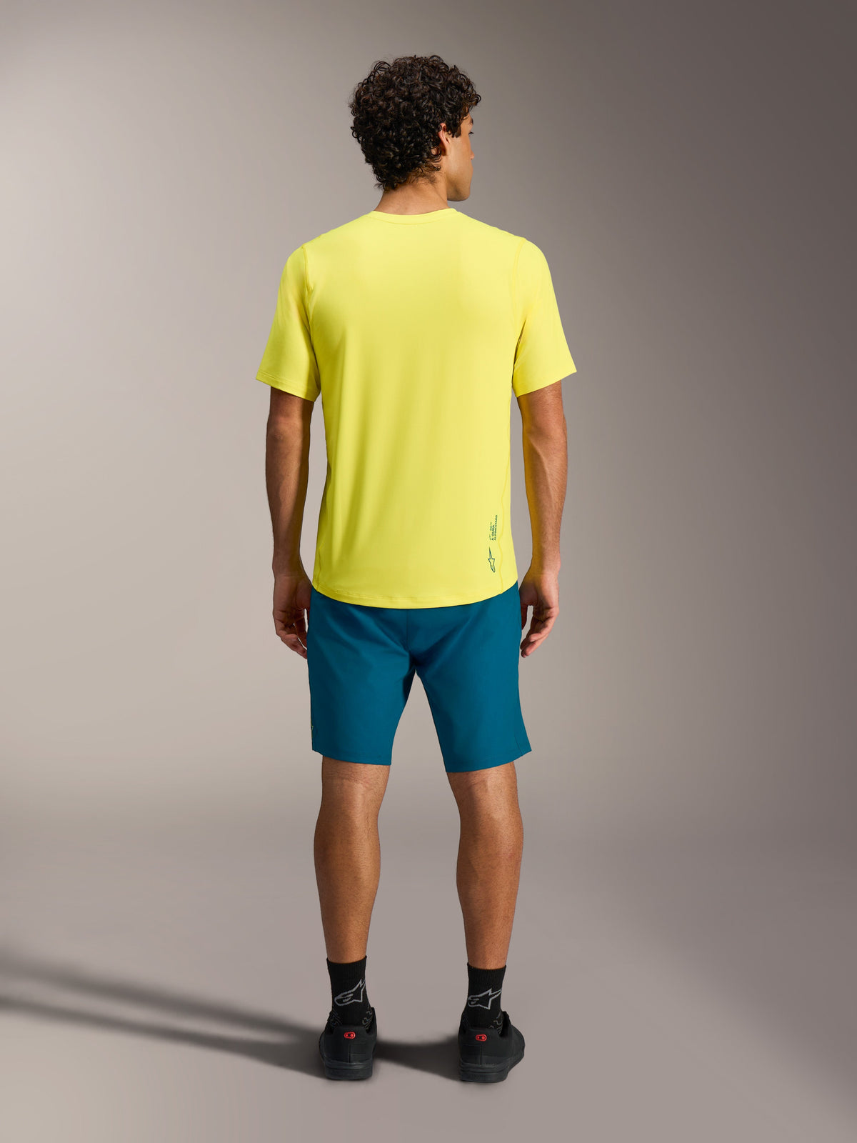 Maglia Alpinestars A-Dura Ride Giallo Fluo, vista posteriore di maglia MTB traspirante con vestibilità casual.