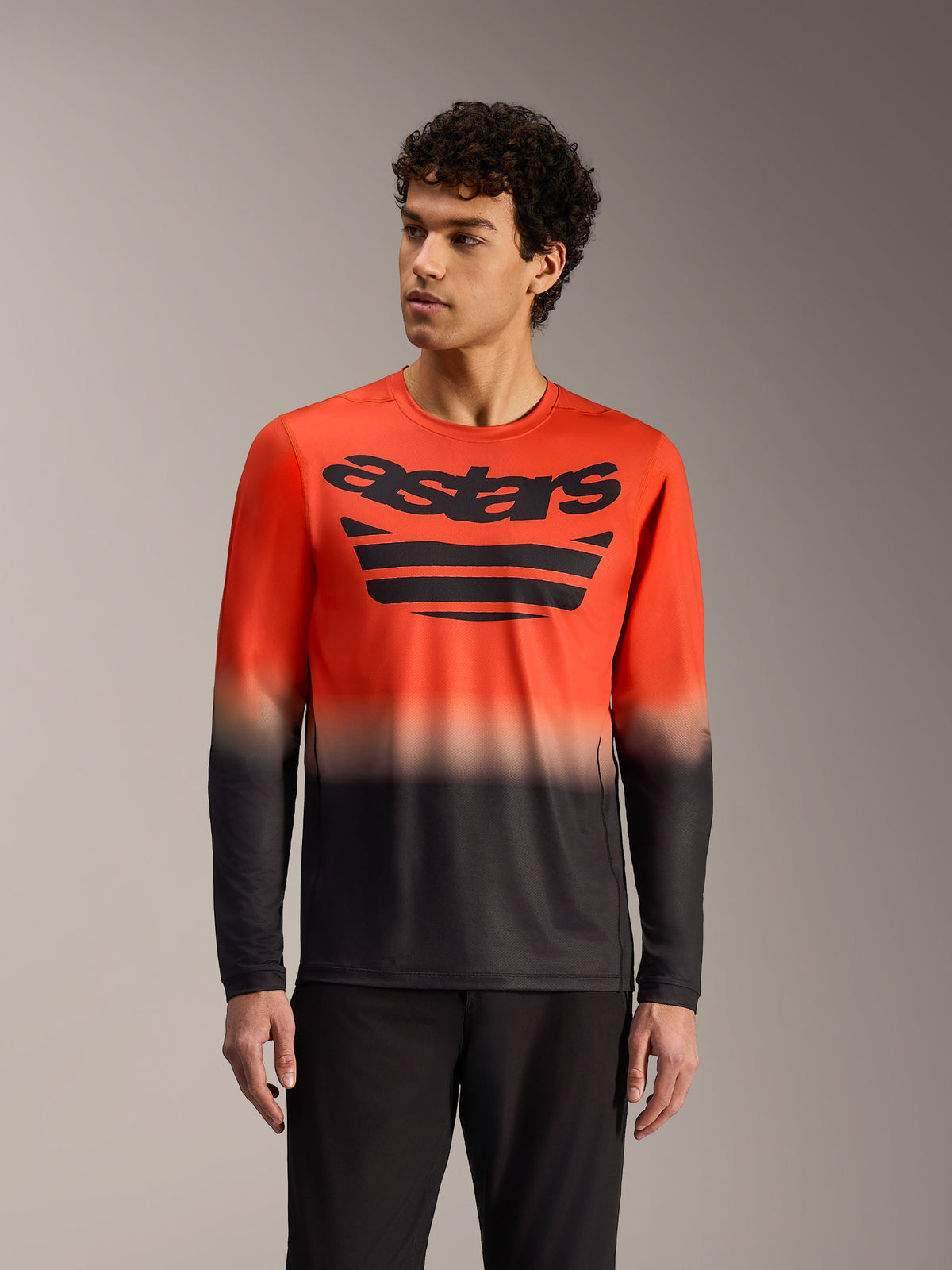 Maglia Alpinestars A-Dura ASTARS 2.0 manica lunga, sfumatura arancione e nera con grafica audace sul petto, performance MTB