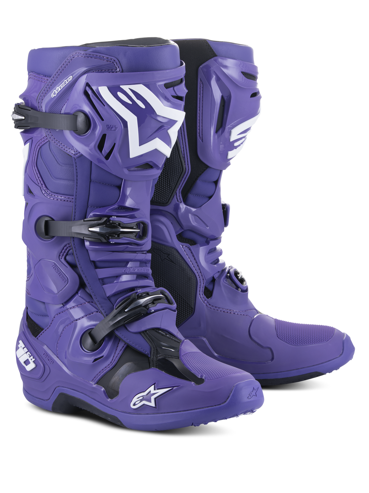Stivali da motocross Alpinestars Tech 10, viola ultravioletto con accenti neri e bianchi, dotati di sistema di chiusura a tripla fibbia, calotta protettiva in TPU e loghi Alpinestars a stella, calzature da competizione fuoristrada ad alte prestazioni.
