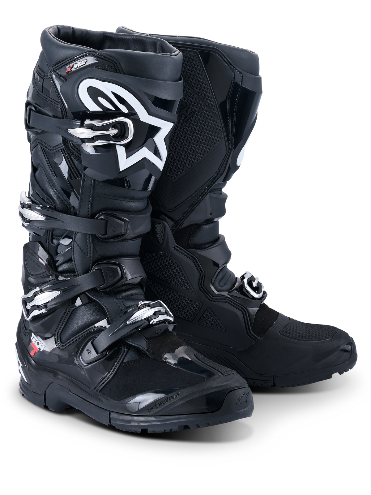 Stivali Alpinestars Tech 7 Enduro Drystar® 2026, stivali professionali da motocross ed enduro, nero, con sistema di chiusura a quattro fibbie, logo Astar bianco sullo stinco, robusti pannelli protettivi in TPU e suola specializzata per il grip fuoristrada.