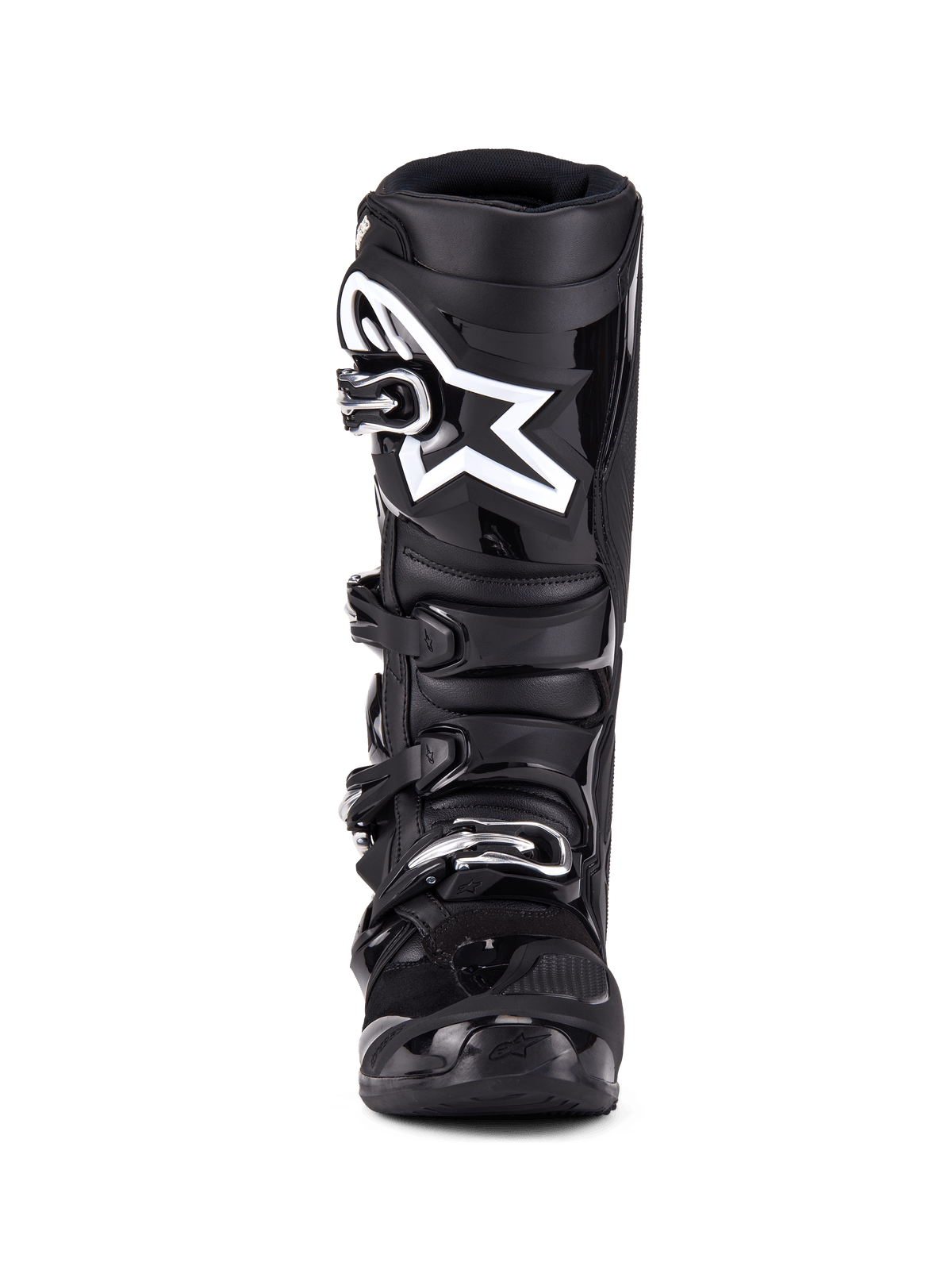 Stivali Alpinestars Tech 7, stivali da motocross, nero, vista frontale con sistema di chiusura a quattro fibbie, logo a stella Alpinestars bianco in evidenza sulla placca parastinchi, scocca in TPU resistente e protezione rinforzata per corse off-road