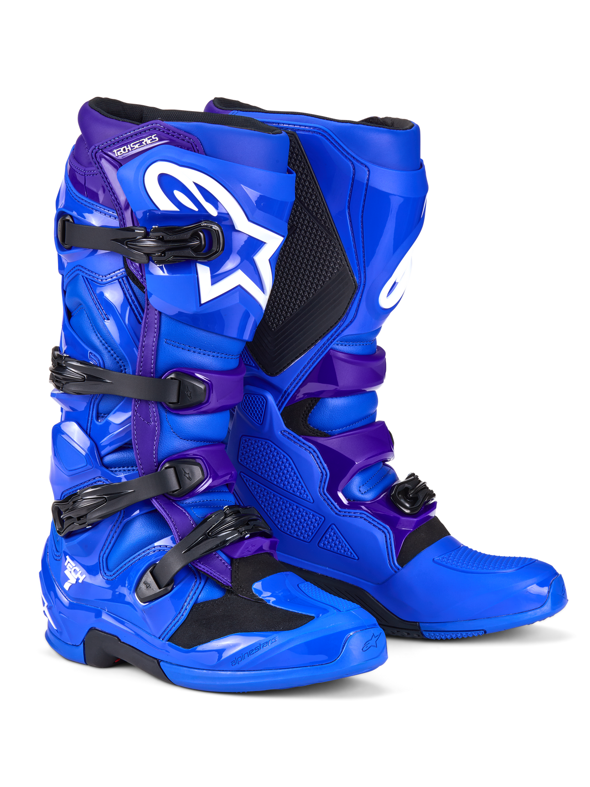 Stivali Alpinestars Tech 7, stivali da motocross, blu e viola, con loghi Alpinestars bianchi, pannelli protettivi in TPU, sistema di chiusura a quattro fibbie e suola robusta per fuoristrada