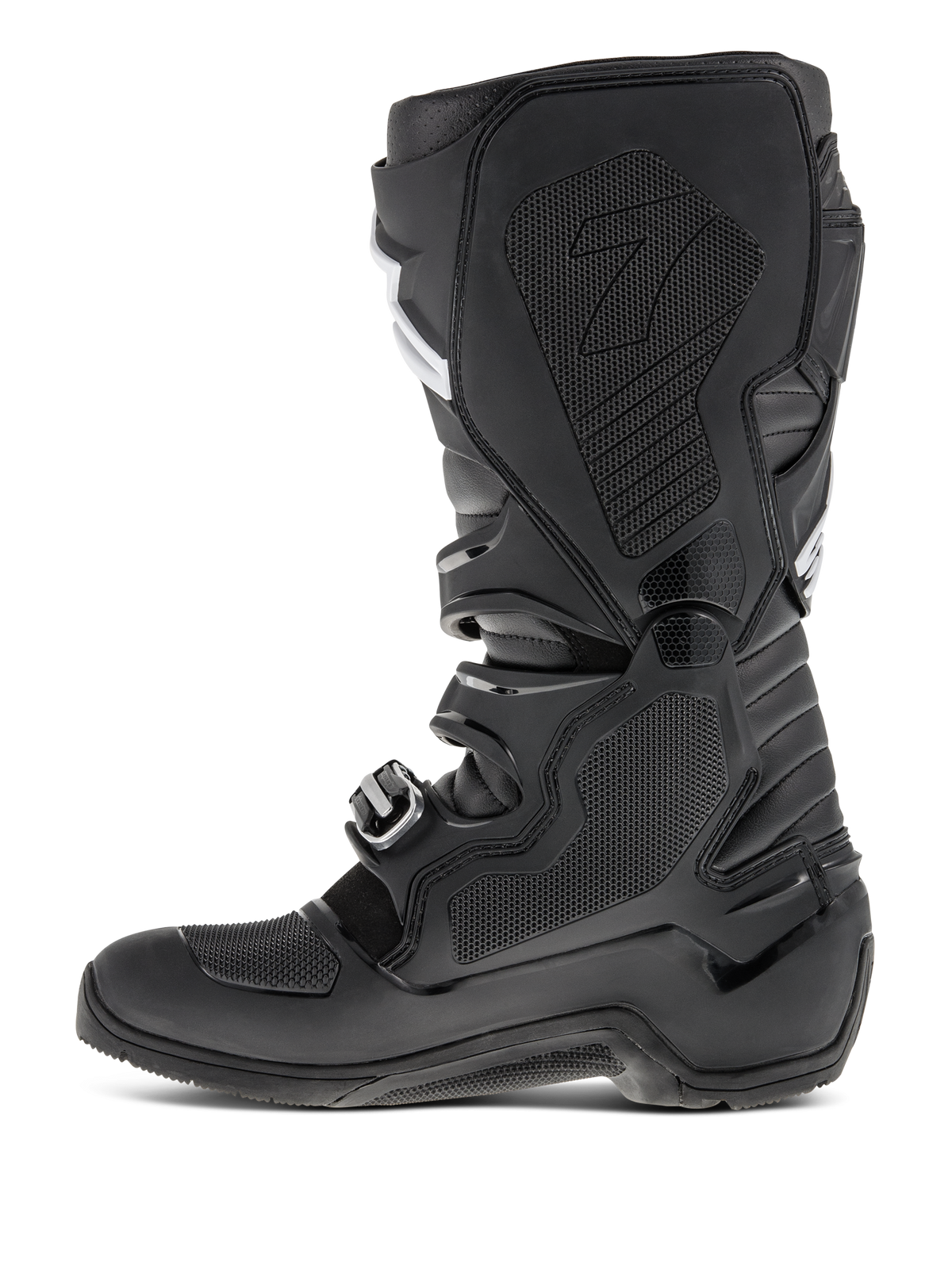 Stivali Alpinestars Tech 7 Enduro, nero, vista del profilo laterale con focus sul lato mediale, inserto in gomma a nido d'ape, pannelli protettivi in TPU e sistema di chiusura con fibbie per prestazioni motocross off-road