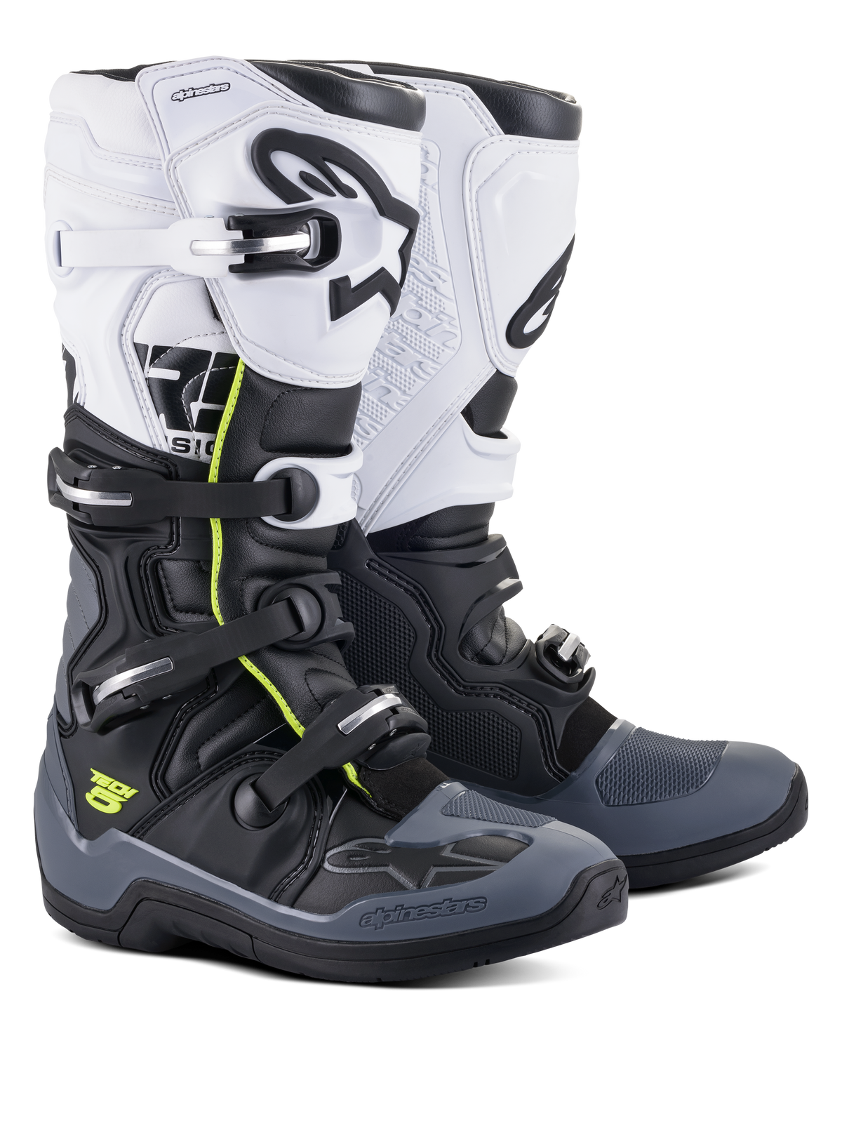 Stivali Alpinestars Tech 5, stivali da motocross e off-road, nero, grigio scuro e bianco, con dettagli giallo neon, sistema di chiusura a quattro fibbie, pannello superiore bianco con logo Astars nero, protezione su punta e tallone grigio scuro e costruzione in microfibra resistente