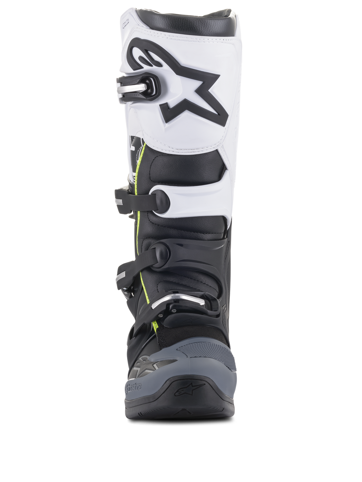 Stivali Alpinestars Tech 5, stivali da motocross, nero, grigio scuro e bianco, vista frontale con sistema di chiusura multi-fibbia, pannello superiore bianco con logo Astars nero, punta rinforzata grigio scuro e discreti accenti gialli