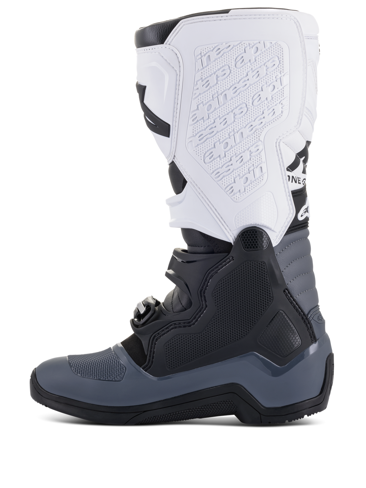 Stivali Alpinestars Tech 5, stivali da motocross, nero, grigio scuro e bianco, vista laterale con chiusure a fibbia multiple, marchio in rilievo sulla placca tibiale bianca e costruzione robusta per prestazioni fuoristrada