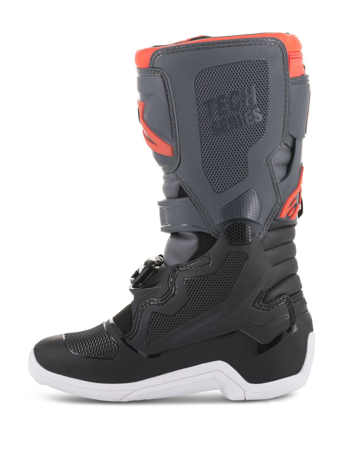 Stivali Alpinestars Youth Tech 7S, stivali da motocross, nero, grigio scuro e rosso fluorescente, vista laterale con pannelli protettivi in TPU, marchio Tech Series e suola bianca