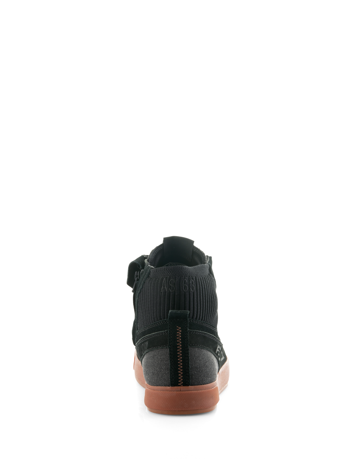 Scarpe Alpinestars Stated, scarpe da moto urbane Black Gum, vista posteriore con suola in gomma vulcanizzata, tomaia in camoscio nero e tela, colletto della caviglia in maglia a coste