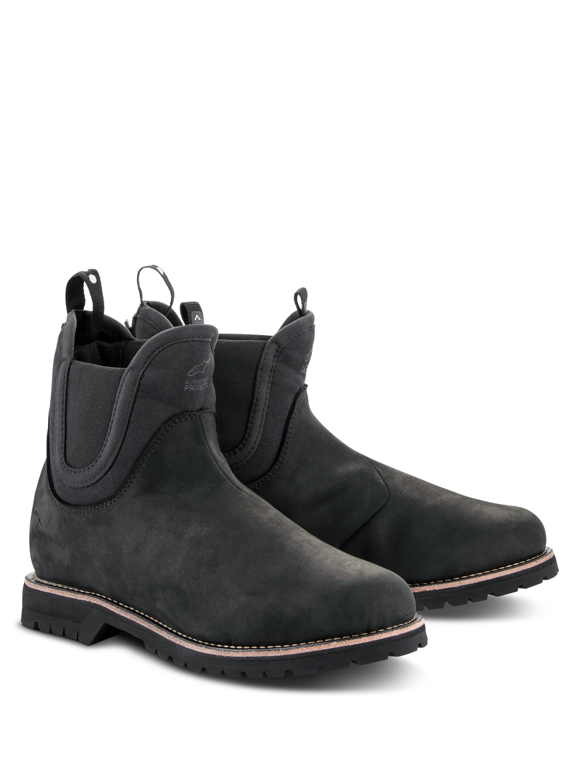 Scarpe Alpinestars Turnstone, stivali da moto neri stile Chelsea, tomaia in pelle bovina opaca con pannelli laterali elastici e linguette posteriori, calzature da guida urbana con suola carrarmato robusta e cuciture bianche sul guardolo