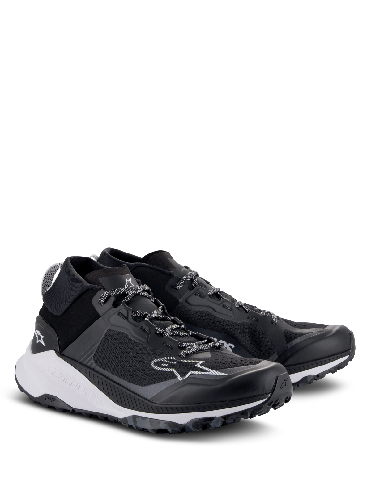 Scarpe Alpinestars Meta XR V2, scarpe sportive, nero, bianco e grigio scuro, con tomaia in rete monopezzo, intersuola bianca ammortizzata e suola robusta, design atletico casual con logo Alpinestars e lacci a fantasia