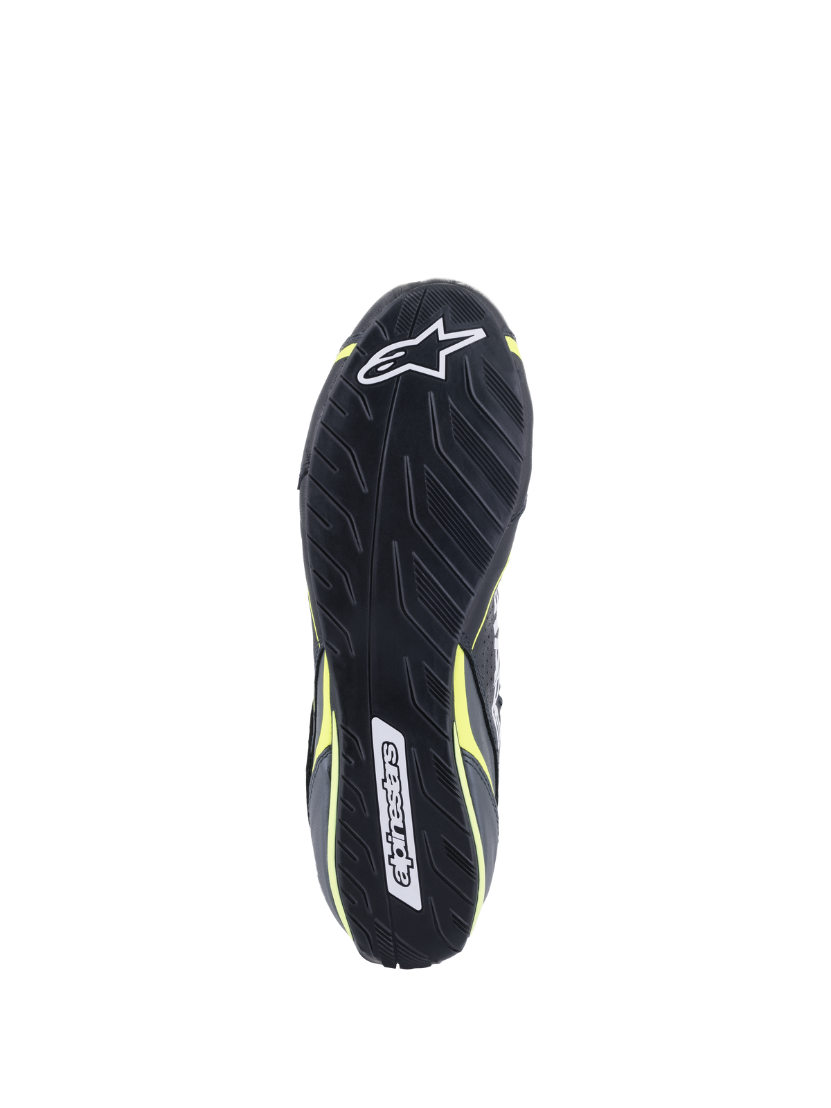 Alpinestars Scarpe Tech-1 T V3 FIA, vista della suola, nero con accenti giallo fluo, suola in gomma asimmetrica ispirata al battistrada, con loghi Alpinestars e trama testurizzata per sensibilità sui pedali e aderenza.