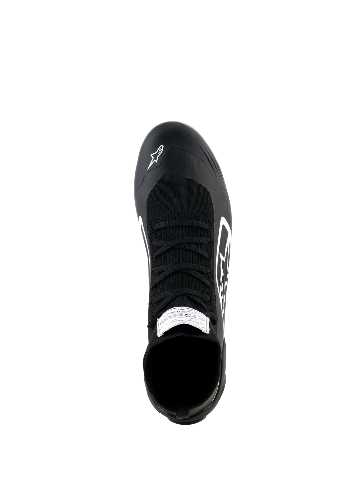 Alpinestars Supertech K Shoes, scarpe da karting, nero e bianco, vista dall'alto con tomaia completamente in maglia e lacci neri, logo Alpinestars bianco sulla punta ed etichetta di certificazione FIA sulla linguetta