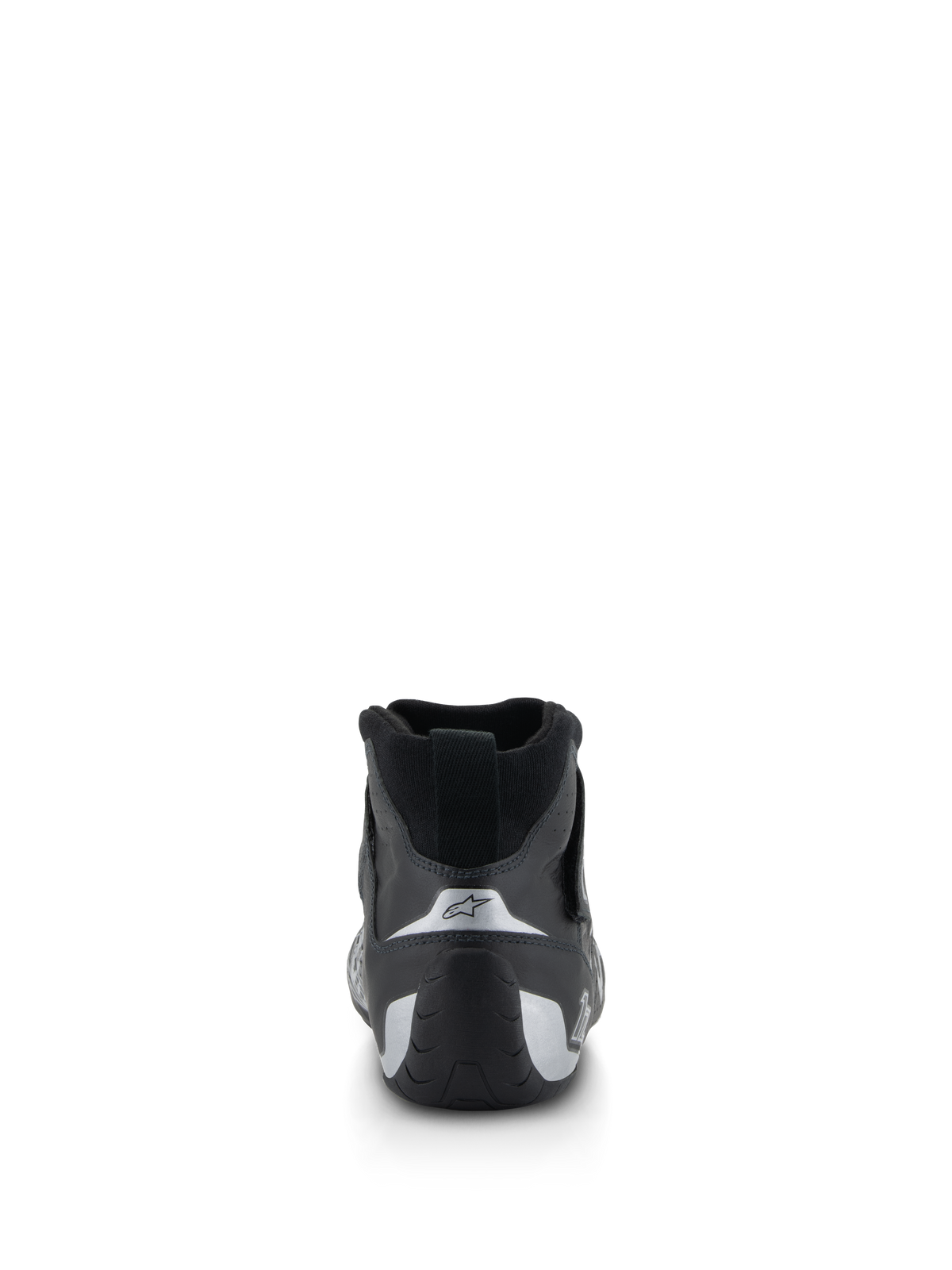 Scarpe Alpinestars Tech-1 Z V3 FIA, scarpe da racing auto, nero e argento, vista posteriore che mostra il tallone sagomato con accenti argento e il logo a stella, calzature professionali per motorsport