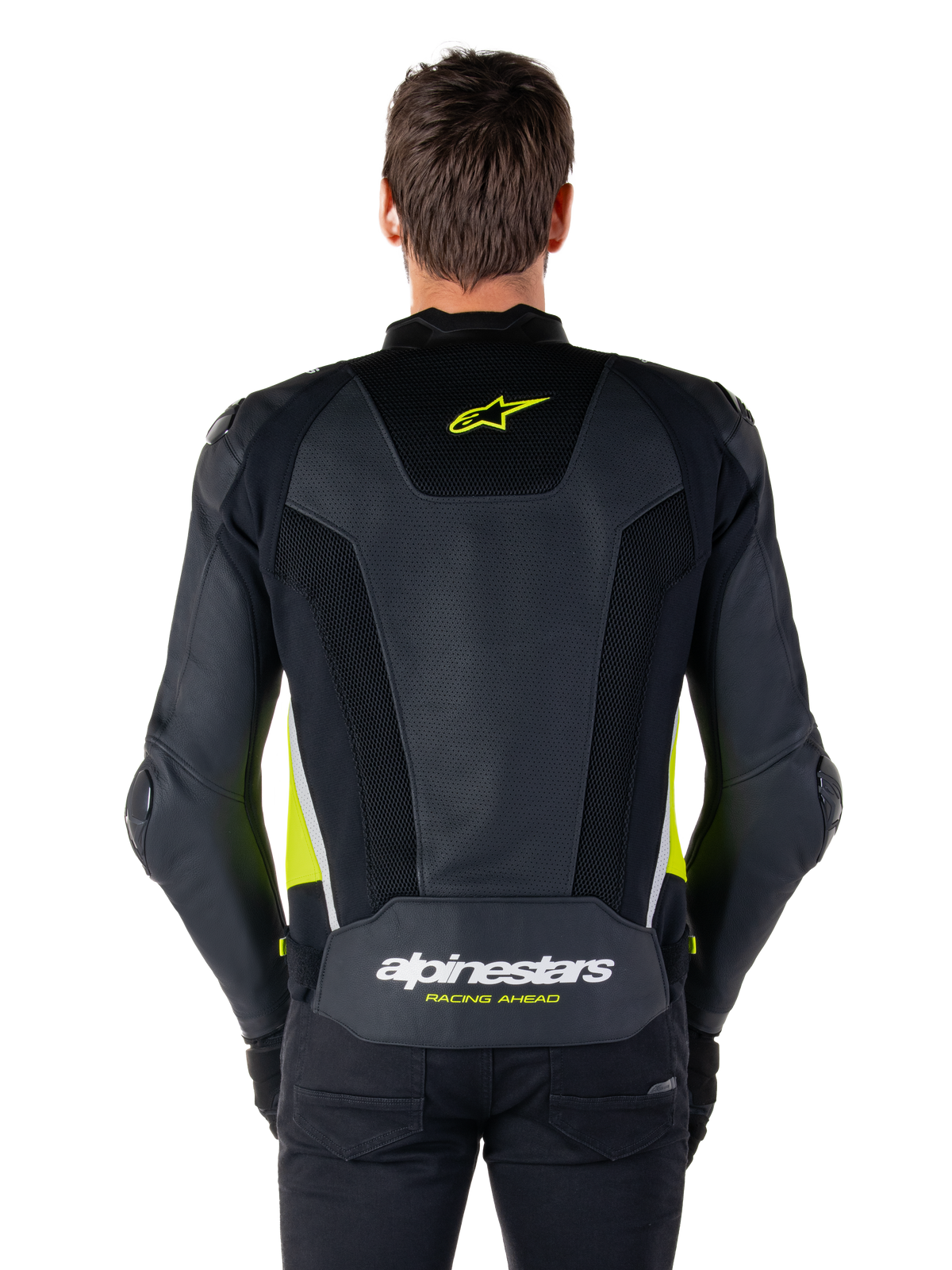 Giacca in pelle Alpinestars Missile V3 Airflow, vista posteriore, nero con accenti giallo fluo e bianco, ampi pannelli in pelle traforata per la ventilazione, branding Alpinestars sulla parte superiore e inferiore della schiena, giacca sportiva da moto ispirata alle corse
