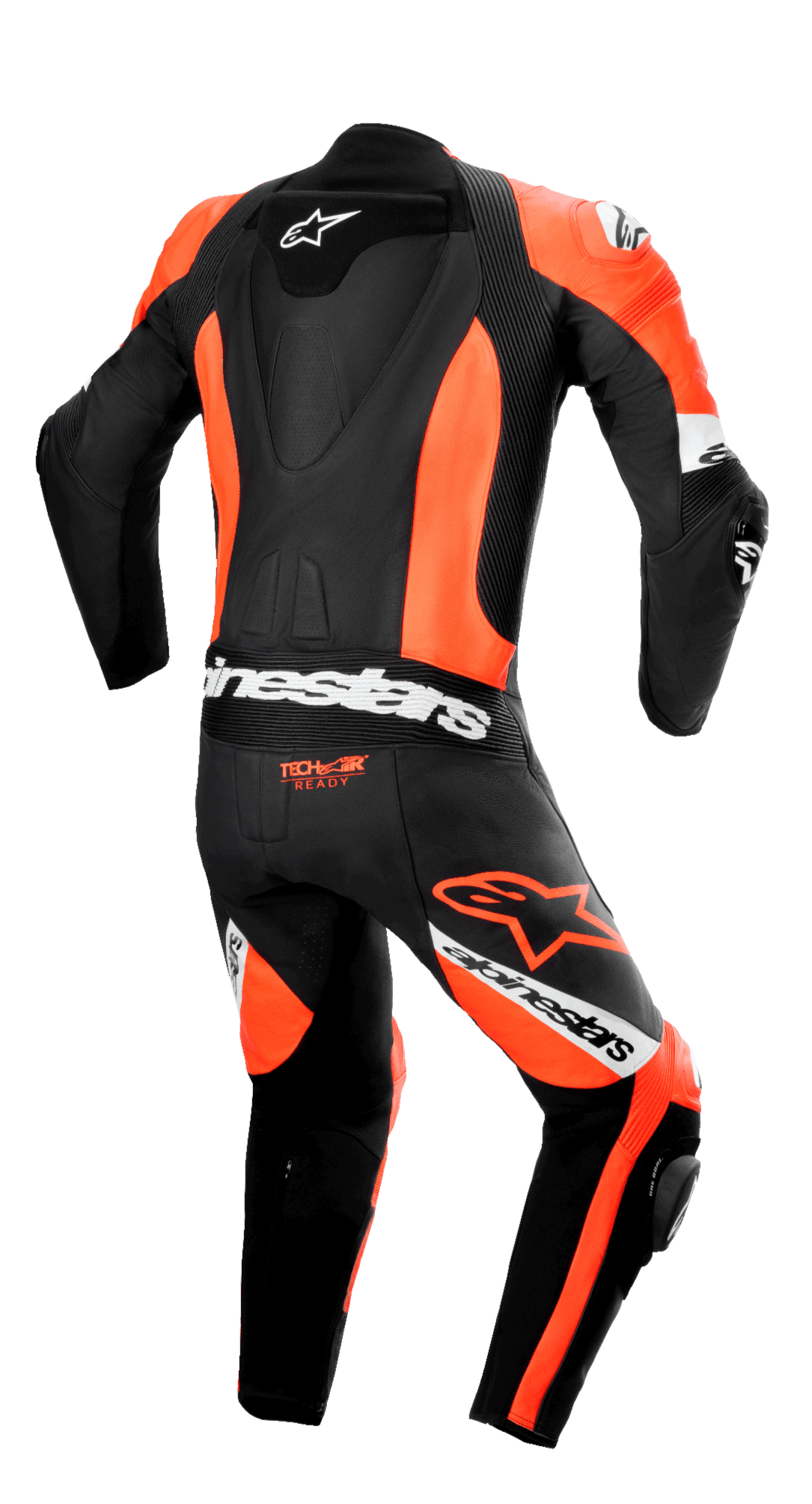 Tuta in pelle intera Alpinestars Missile V2 Ward, vista posteriore, nero e rosso fluo con dettagli bianchi, caratterizzata da una gobba aerodinamica snella, pannelli elasticizzati a fisarmonica sulla parte bassa della schiena e sulle ginocchia, logo 'Tech-Air Ready' e branding Alpinestars in evidenza per gare su pista professionali.