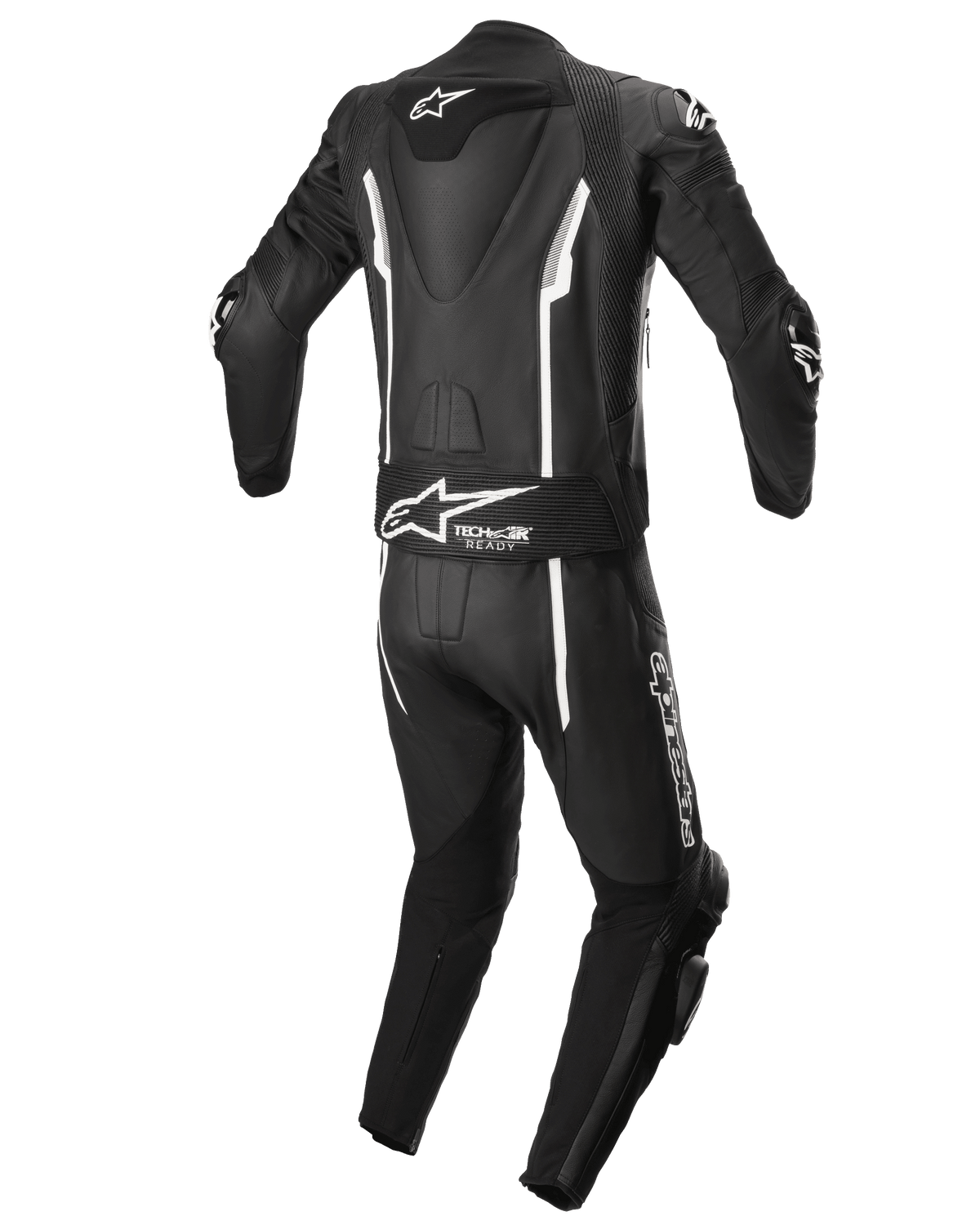 Alpinestars Missile V2 2-Piece Leather Suit, tuta da moto da corsa, nero e bianco, vista posteriore con gobba aerodinamica, pannello elasticizzato Tech-Air Ready, dettagli lineari bianchi e branding Alpinestars sulla parte bassa della schiena e sulla gamba