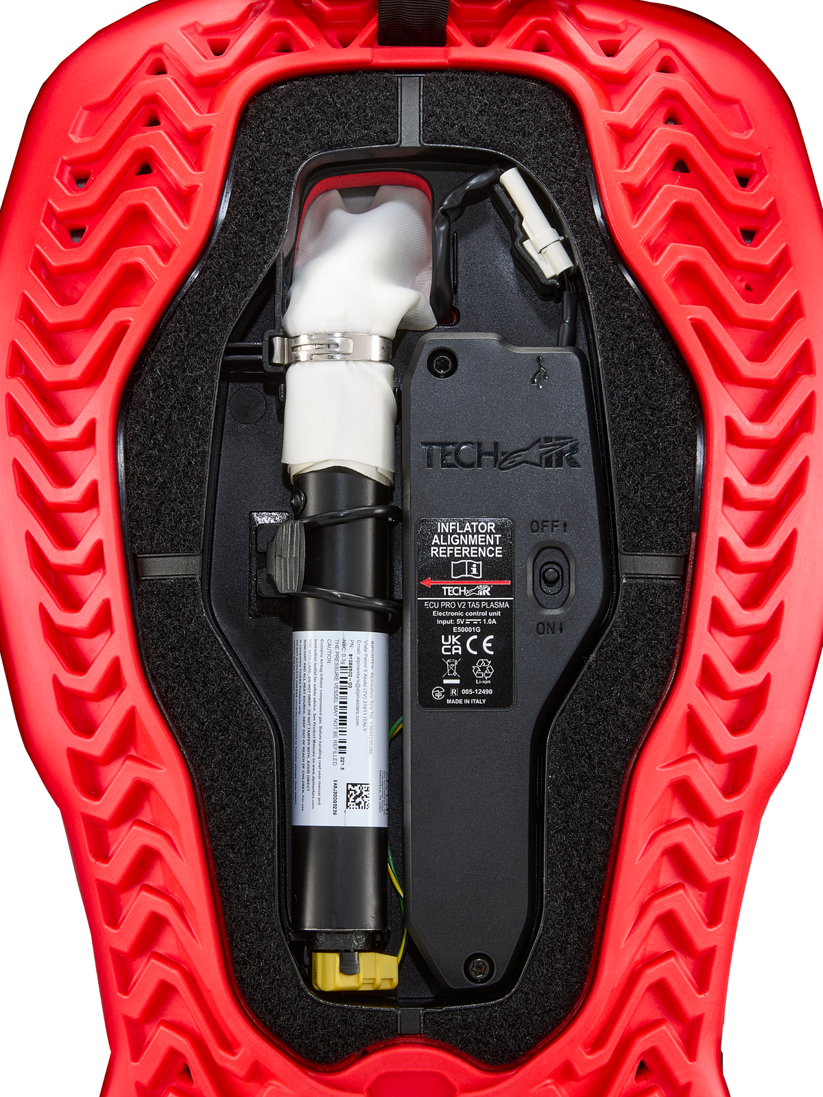 Alpinestars Bomboletta Di Ricambio Per Airbag Tech-Air® 5 Plasma, centralina ECU nera e gonfiatore bianco in un guscio rosso scanalato, accessorio airbag da moto.