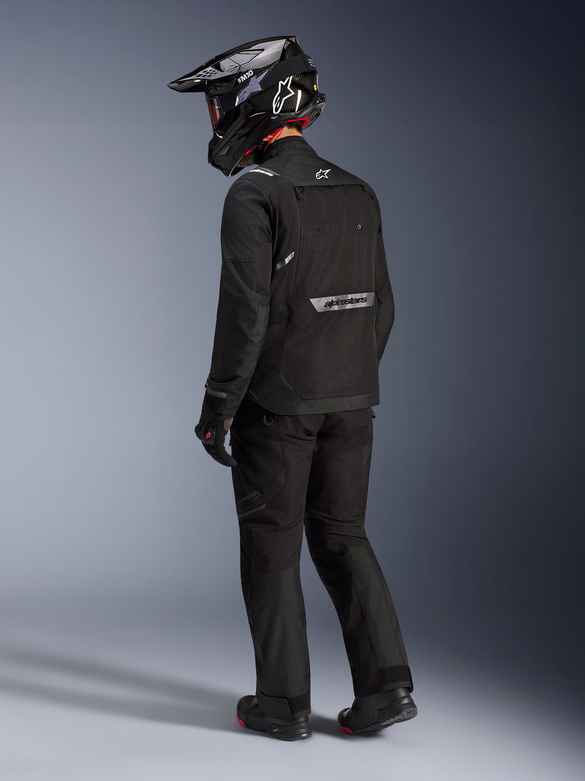 Alpinestars Giacca Cusco Drystar®, giacca da moto adventure touring da uomo, nera, in tessuto, vista posteriore con marchio riflettente