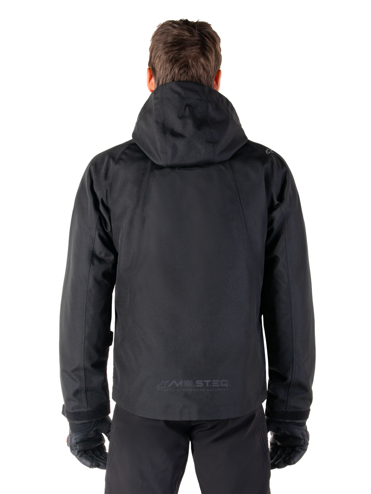 Alpinestars parka Morush impermeabile, giacca da moto urban da uomo, nero, vista posteriore con cappuccio e logo MO.ST.EQ.