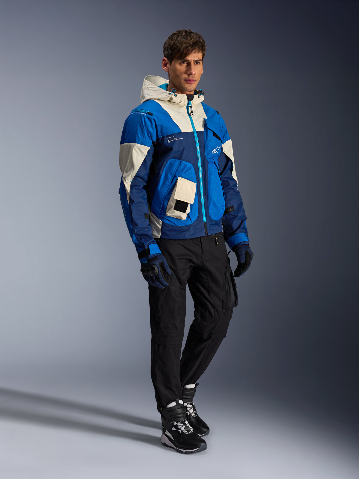 Alpinestars Giacca Mogress Air in Blue Almond, giacca da moto urban da uomo, blu e crema, con cappuccio e tasche utility.