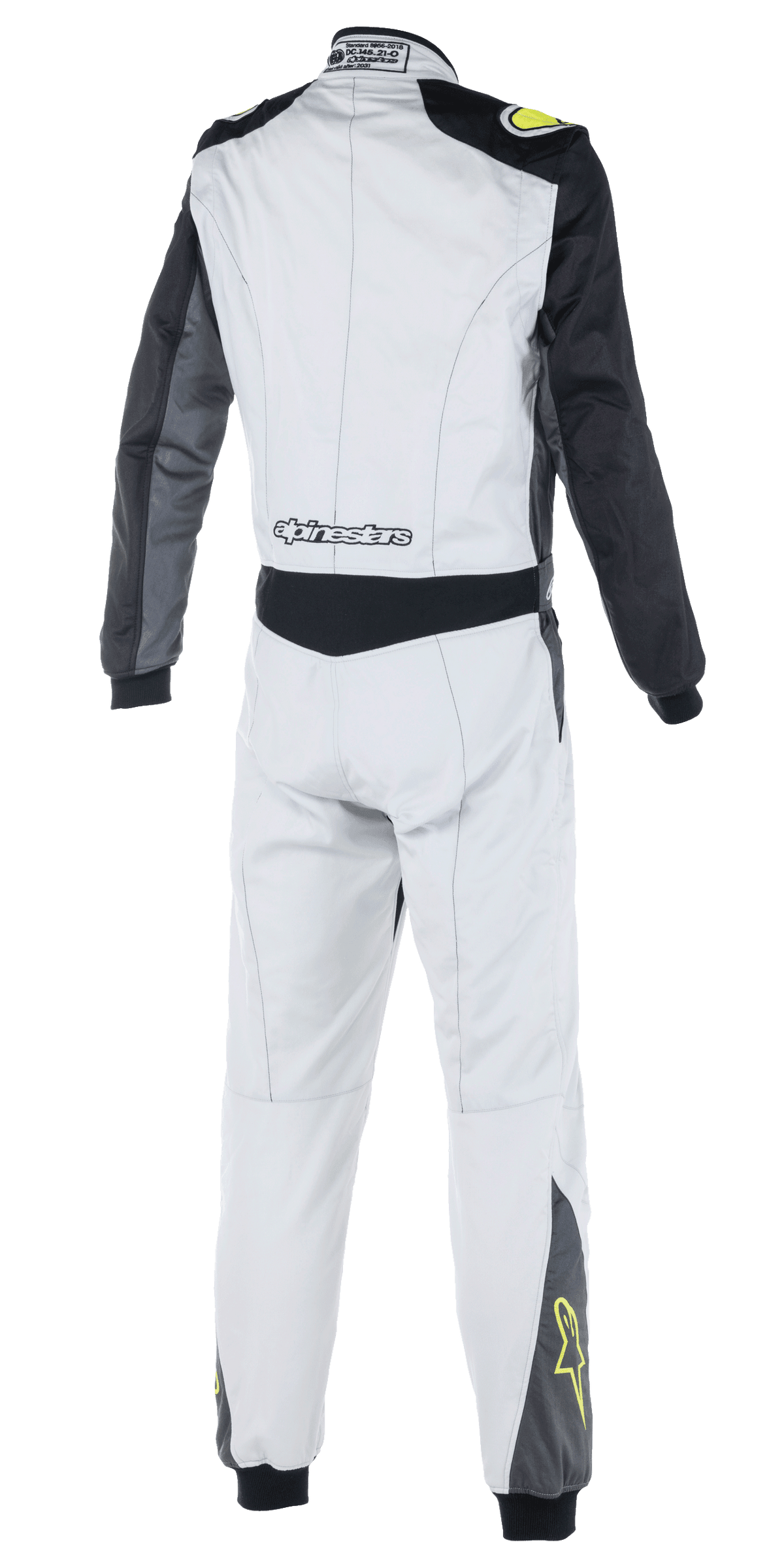 Tuta Alpinestars Atom FIA, tuta da corsa auto, argento, antracite e giallo fluo, vista posteriore con maniche nere e pannello in vita, marchio Alpinestars sulla parte bassa della schiena, loghi a stella gialli sulla parte inferiore delle gambe, abbigliamento da motorsport certificato FIA