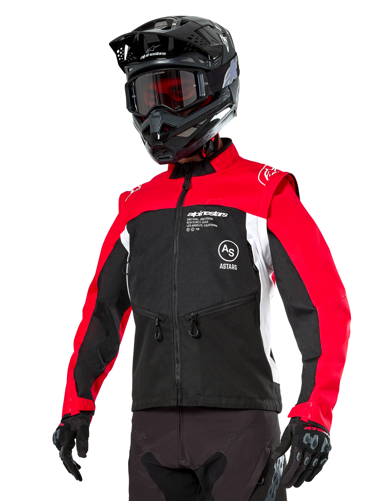 Giacca Alpinestars Pro-Dura, giacca da moto enduro fuoristrada, nero con blocchi di colore rosso acceso e bianco, indossata da un pilota con casco nero e maschera, dotata di tasche anteriori con zip e logo Alpinestars, struttura in tessuto resistente per trail riding