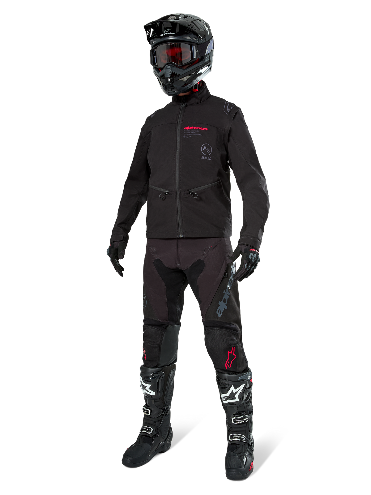 Alpinestars Lite-Dura Softshell Jacket, nero, indossata da un manichino come parte di un completo da fuoristrada, pantaloni neri, stivali neri e bianchi, casco nero con occhiali rossi, abbigliamento professionale da motocross ed enduro.