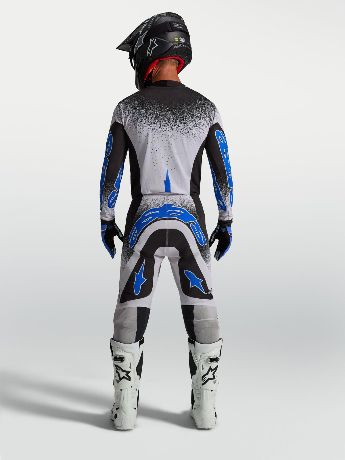 Alpinestars Pantaloni Supertech Hiten AFD, pantaloni da motocross da uomo, blu e bianchi, vista posteriore fuoristrada