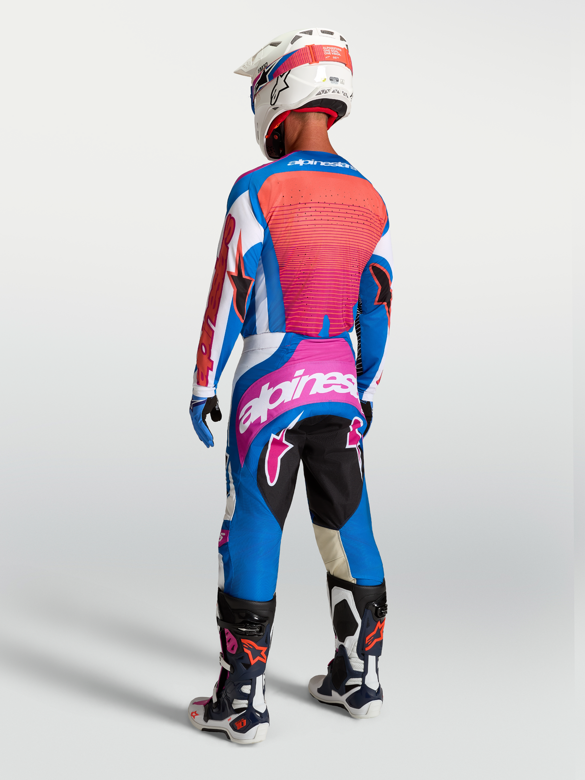 Alpinestars pantaloni Techstar Maven, pantaloni motocross da uomo blu e corallo, vista posteriore, design racing fuoristrada