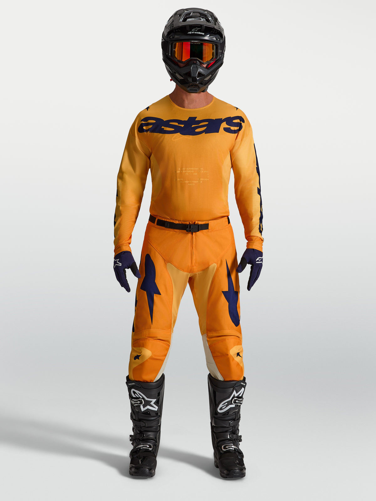 Alpinestars Racer Amber 2027 gear set e pantaloni, completo MX arancione e blu con maglia e stivali da motocross