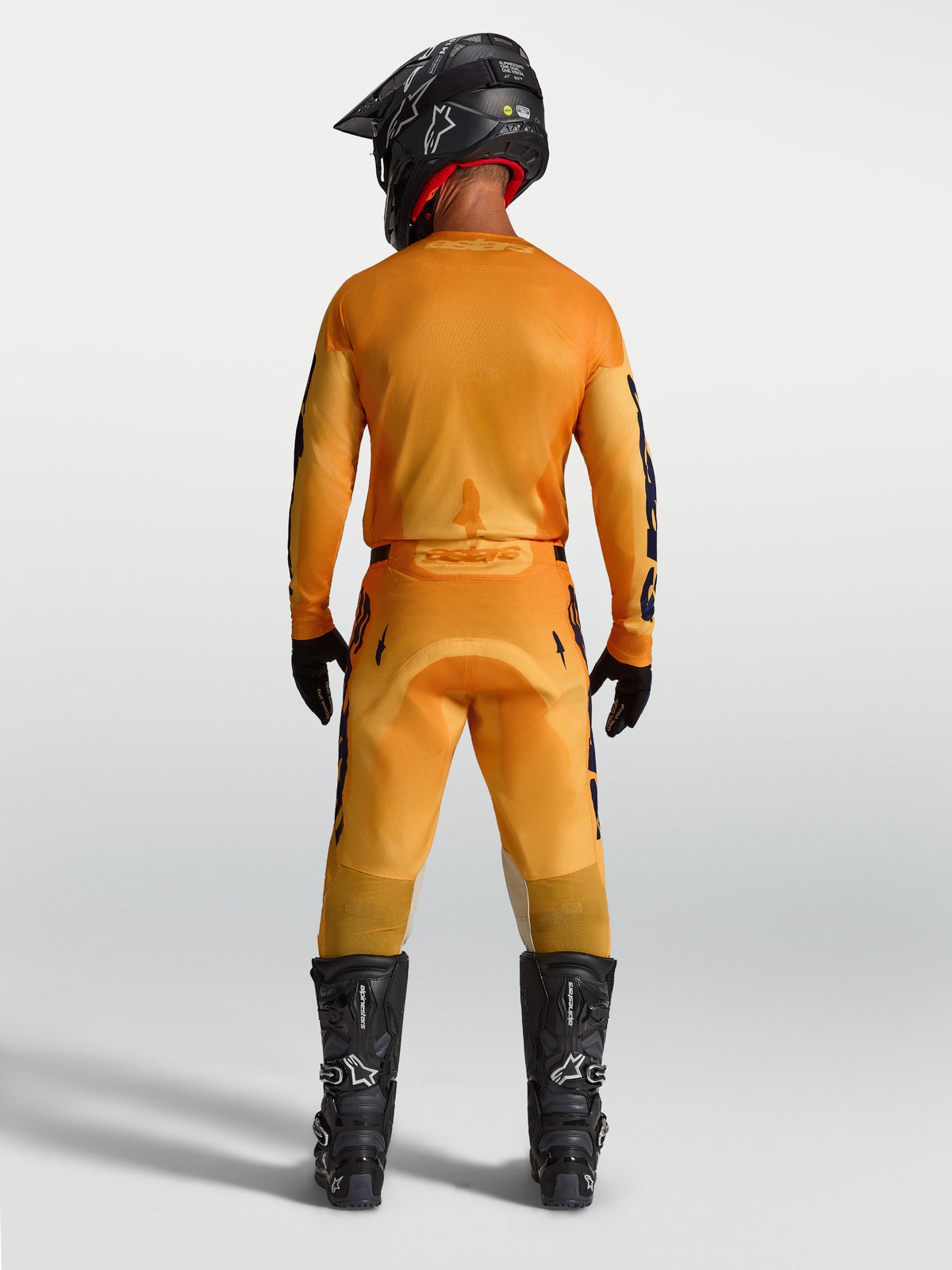 Alpinestars Pantaloni Racer Amber, pantaloni da motocross da uomo, vista posteriore, arancione e blu scuro, struttura sintetica