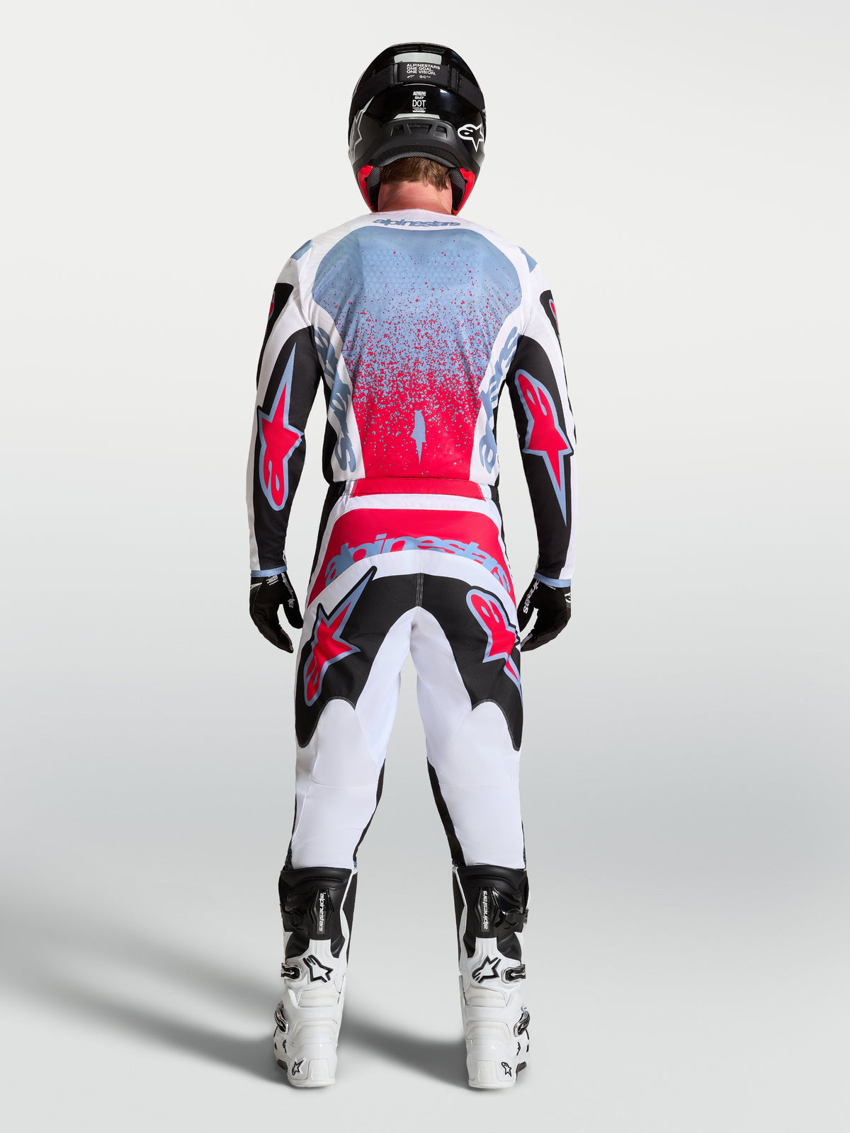 Alpinestars Pantaloni Fluid Drag, pantaloni MX da uomo, nero, bianco e rosso fluo, modello ergonomico 3D, vista posteriore.