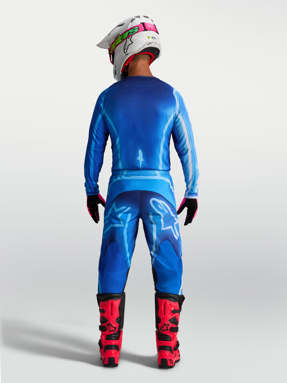 Alpinestars Pantaloni Fluid Kepler, pantaloni da motocross da uomo, blu, vista posteriore con vestibilità ergonomica.