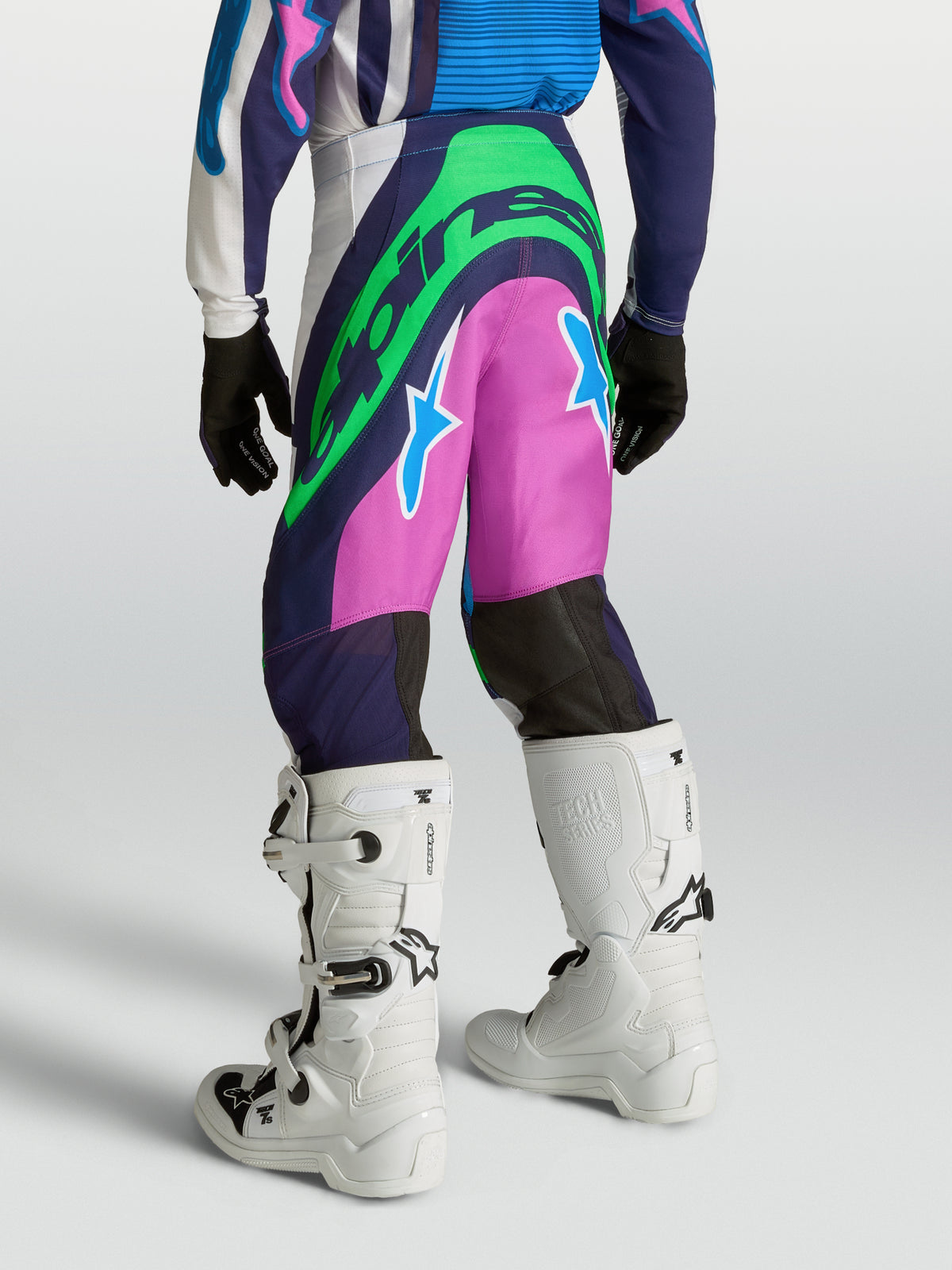 Alpinestars pantaloni Supertech Maven Ragazzo, pantaloni motocross blu e rosa con loghi verde neon, vestibilità race su modello