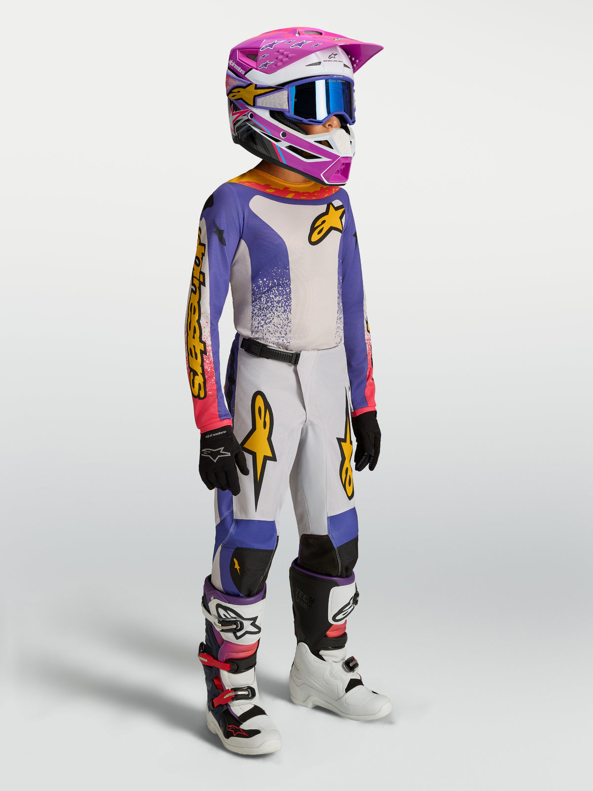 Alpinestars pantaloni Fluid Drag ragazzo 2027, pantaloni motocross blu e oro, vestibilità ergonomica e tessuto resistente.