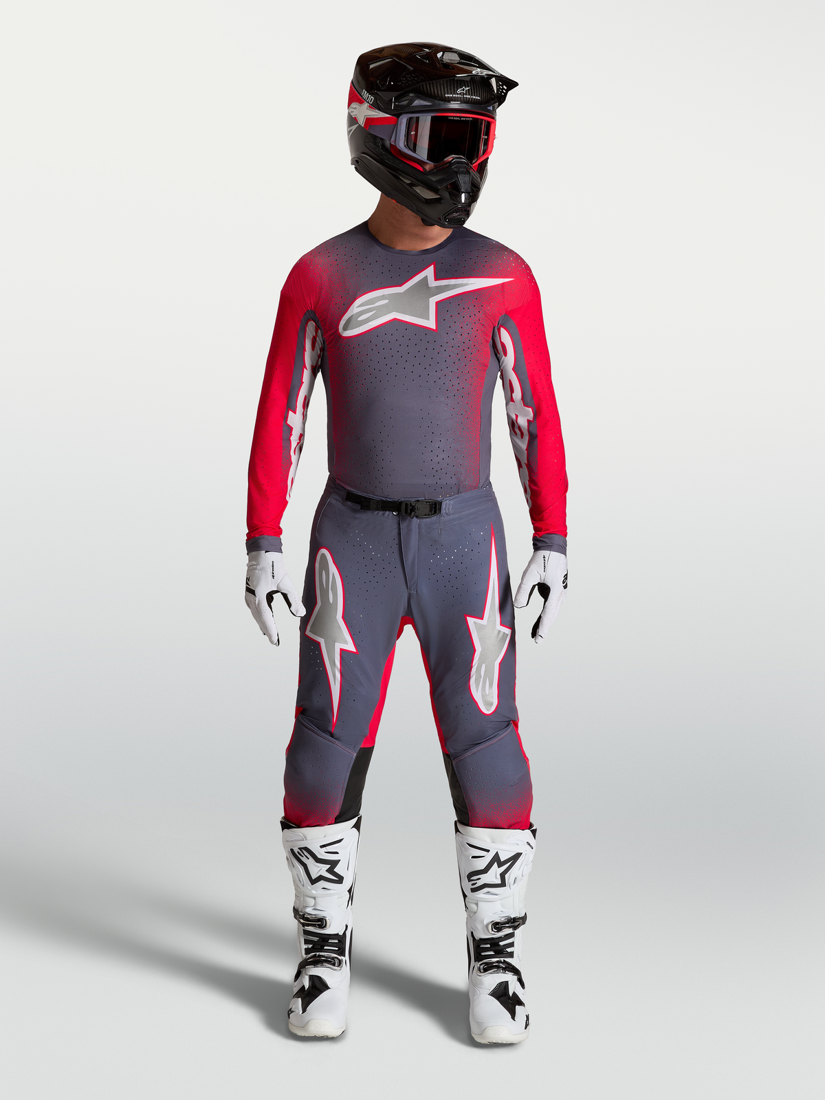 Alpinestars Maglia Supertech Hiten AFD grigia e rossa fluo, maglia motocross con fit atletico e mesh ventilato.