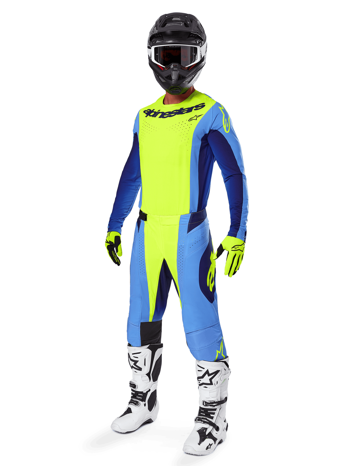 Pilota di motocross con maglia Alpinestars Techstar Melt 2025, giallo fluo e blu, abbinata a pantaloni coordinati, casco nero con maschera, guanti gialli e stivali bianchi e neri, abbigliamento tecnico completo per corse fuori strada