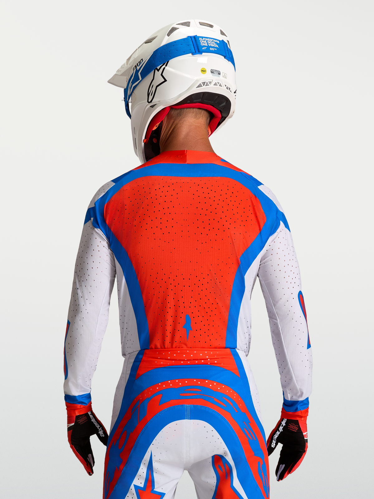Maglia Supertech Vesta Alpinestars, maglia da motocross da uomo, rosso e bianco, vista posteriore con mesh ventilata per gare MX.