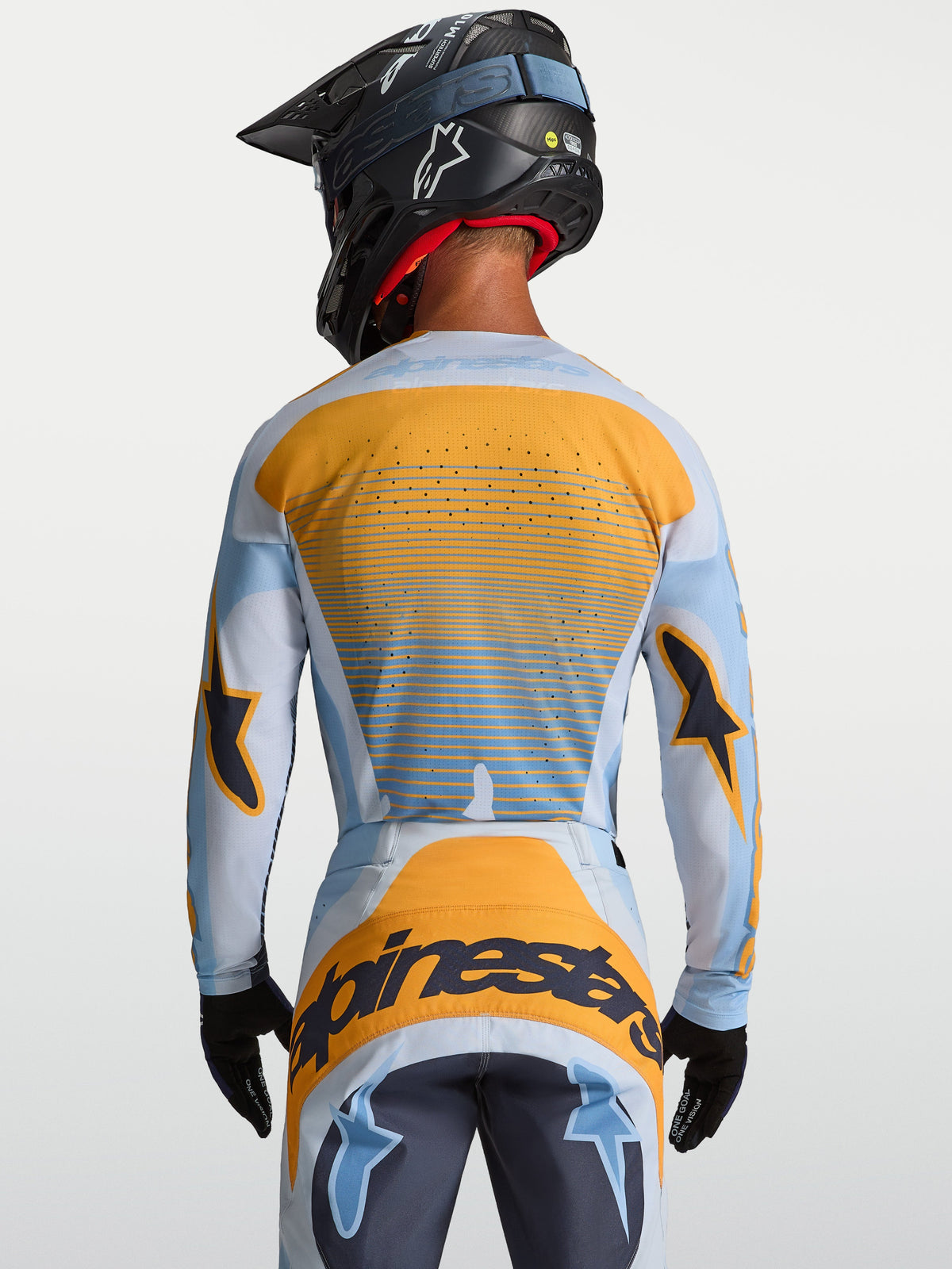 Maglia Techstar Maven Alpinestars, maglia motocross uomo, blu e arancione, vista posteriore con ventilazione laser-cut.