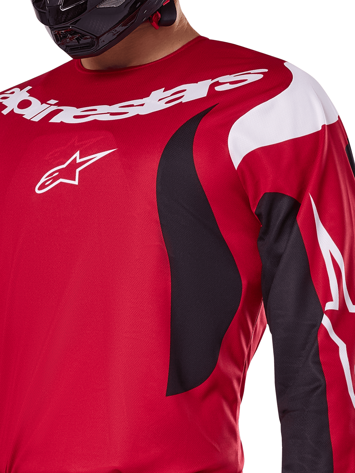 Alpinestars maglia e completo Fluid Haul 2025, top da motocross rosso e nero con loghi bianchi e design atletico.