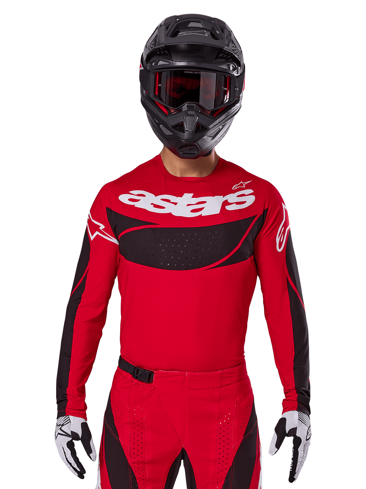 Alpinestars 2025 Techstar Dreem Jersey, maglia da motocross, rosso acceso e nero, con logo 'astars' bianco e pannello ventilato nero sul petto, indossata con pantaloni coordinati, casco nero e guanti bianchi e neri, per gare off-road professionali
