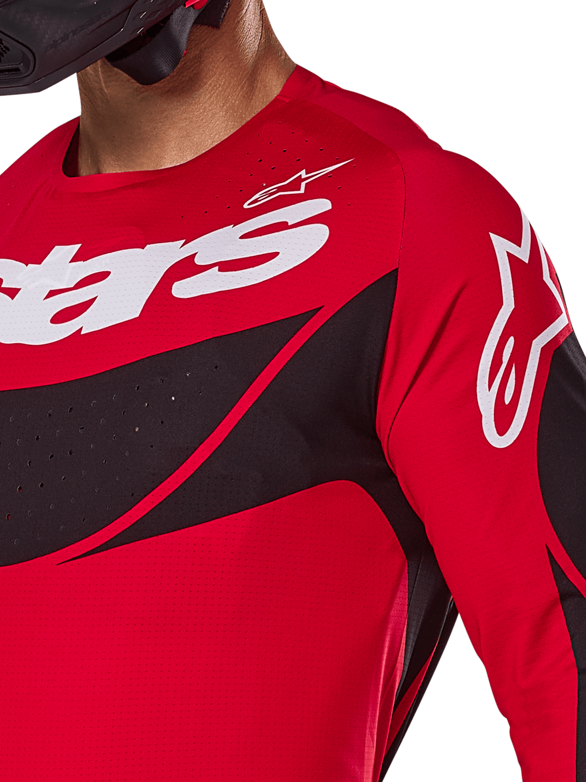 Maglia Alpinestars 2025 Techstar Dreem, maglia da motocross, rosso acceso e nero, vista ravvicinata di petto e spalla con logo bianco, pannelli diagonali neri con perforazioni tagliate al laser per la ventilazione, vestibilità atletica da gara per prestazioni fuoristrada.