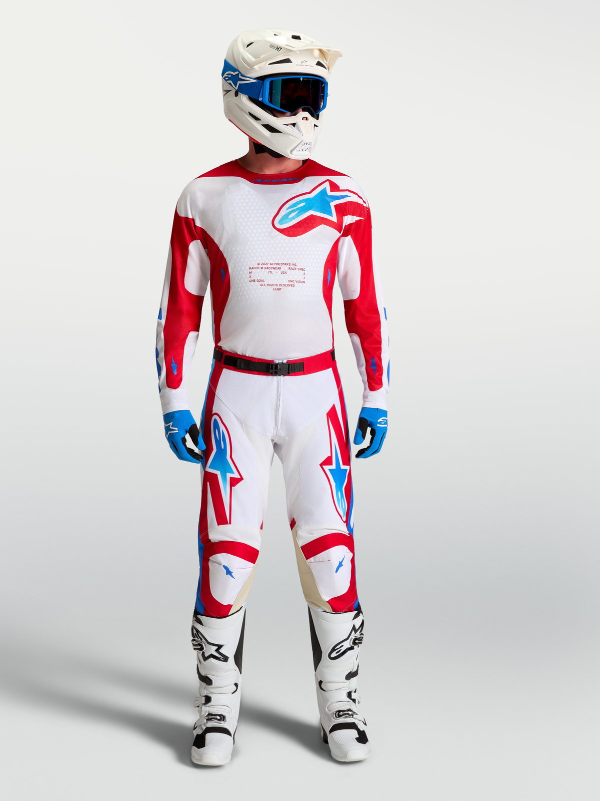 Alpinestars Pantaloni Racer Hunt, pantaloni da motocross uomo, bianchi e rossi con dettagli blu, vestibilità pre-curvata.