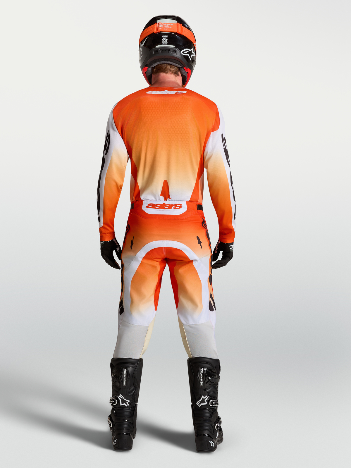 Alpinestars pantaloni Racer Amber AND Racer Amber Gear Set, completo motocross da uomo arancione e bianco, vista posteriore.