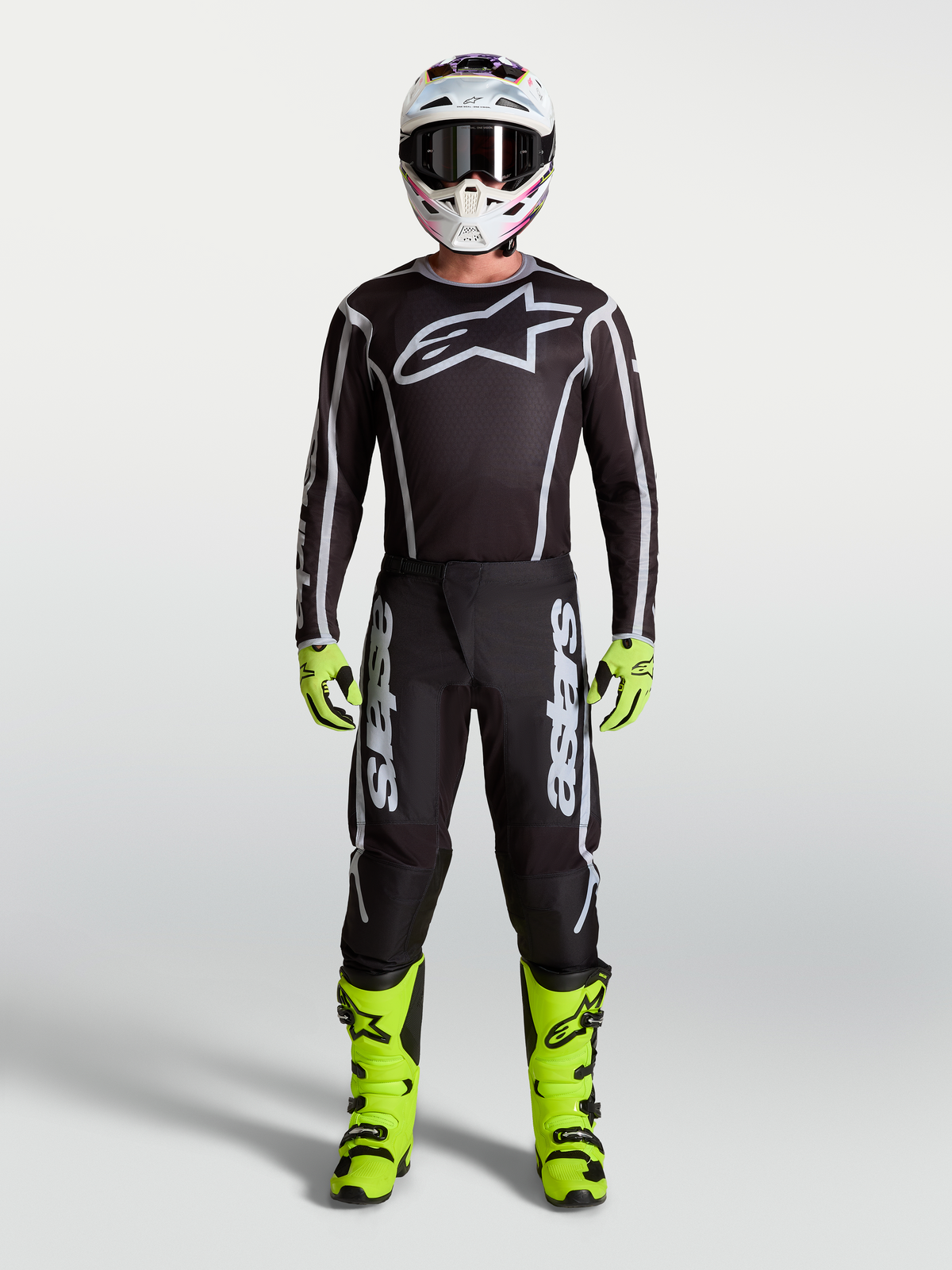 Alpinestars Maglia Fluid Apex V2 e Fluid Apex V2 Gear Set, completo motocross uomo, nero, argento e giallo fluorescente.